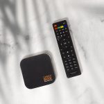 CARROT BOX Device with remote in background